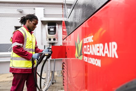 Damani Roberts Franklin a Service Centre Manager plugs in an electric bus at Northumberland Park depot London (6)