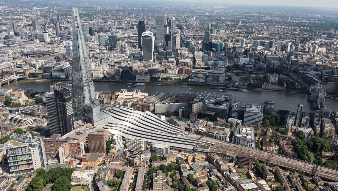 aerial - London Bridge (1): London Bridge station basks in the sun next to the Shard. This is not a CGI but it looks very much like one!
