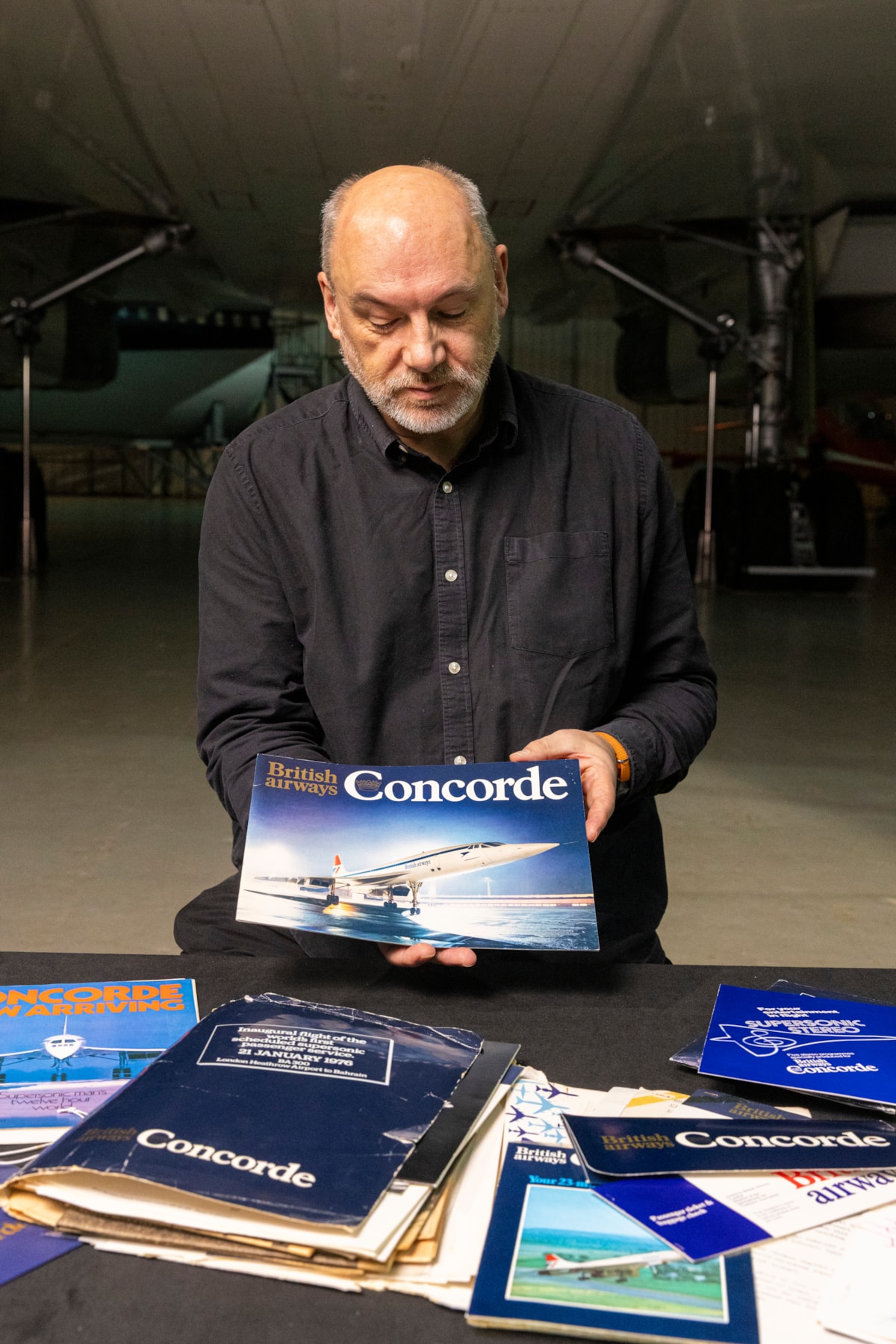 Curator Ian Brown under the wings of Concorde G-BOAA with the archive. Photo © Duncan McGlynn (1)