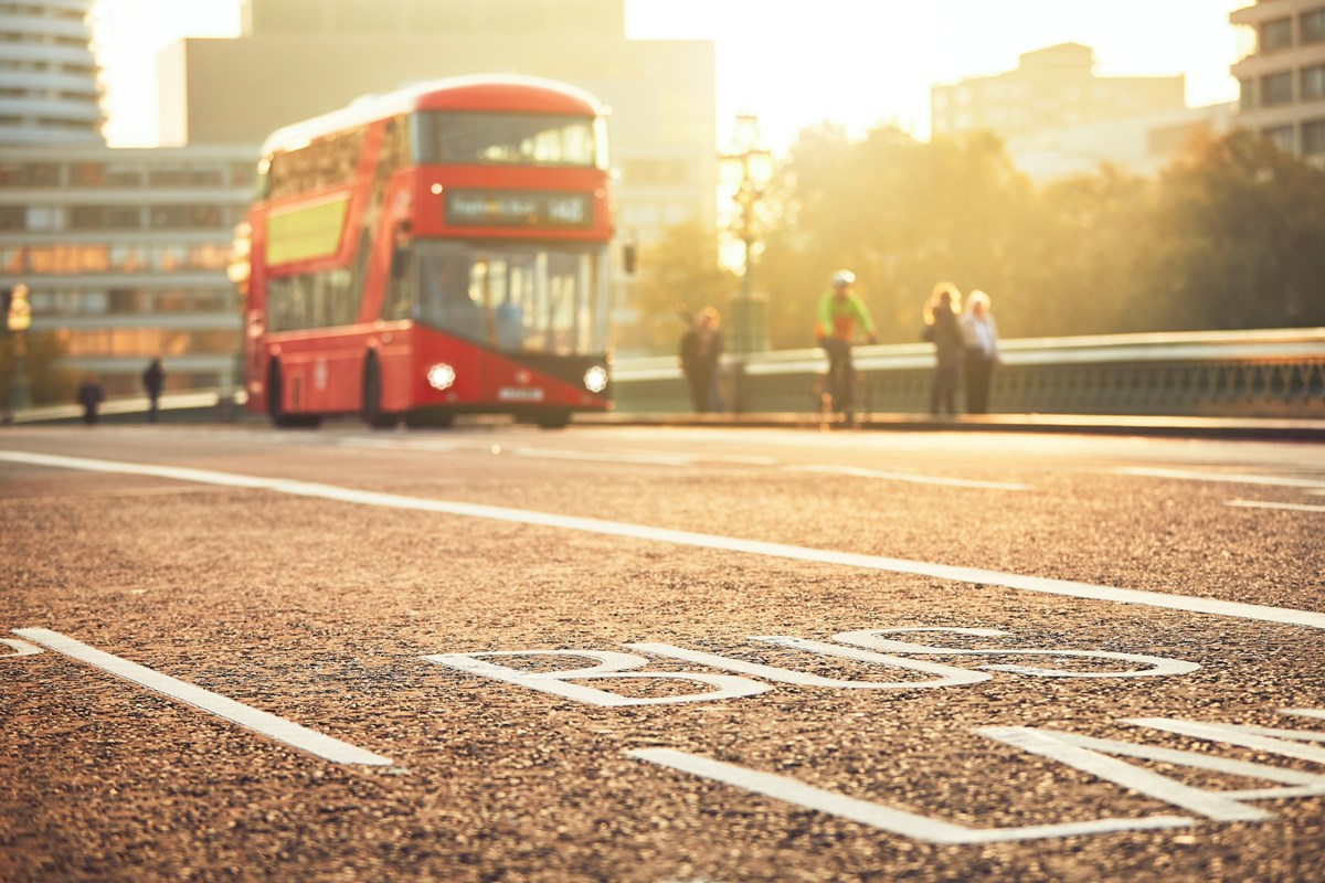 bus and bus lane with sunset