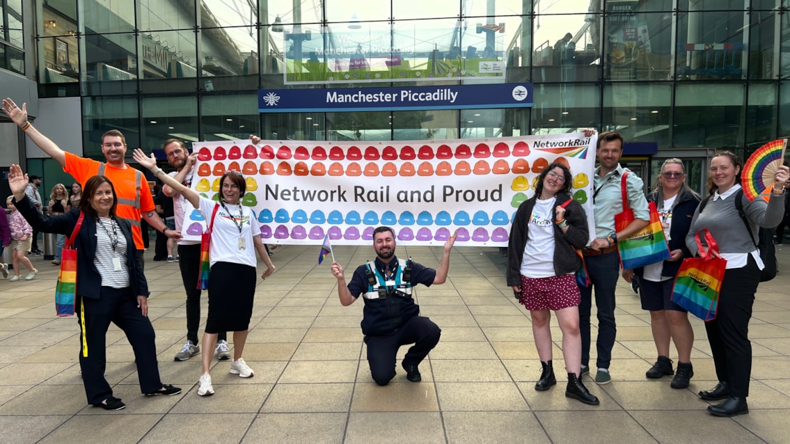 Pride volunteers outside Manchester Piccadilly