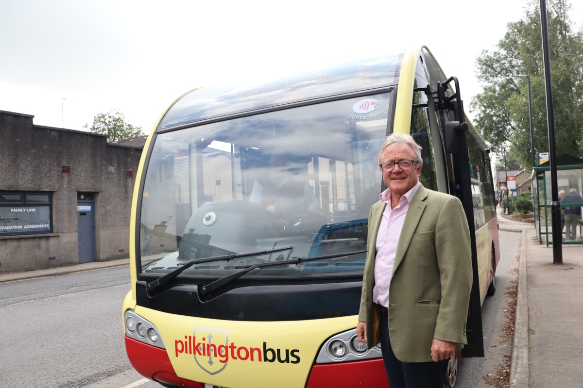 Cllr Swarbrick with the bus