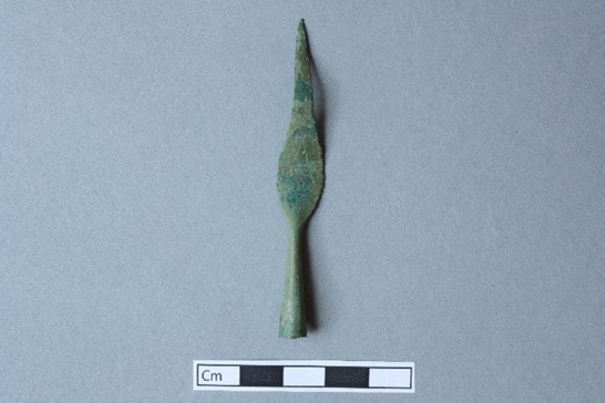 A miniature spearhead votive