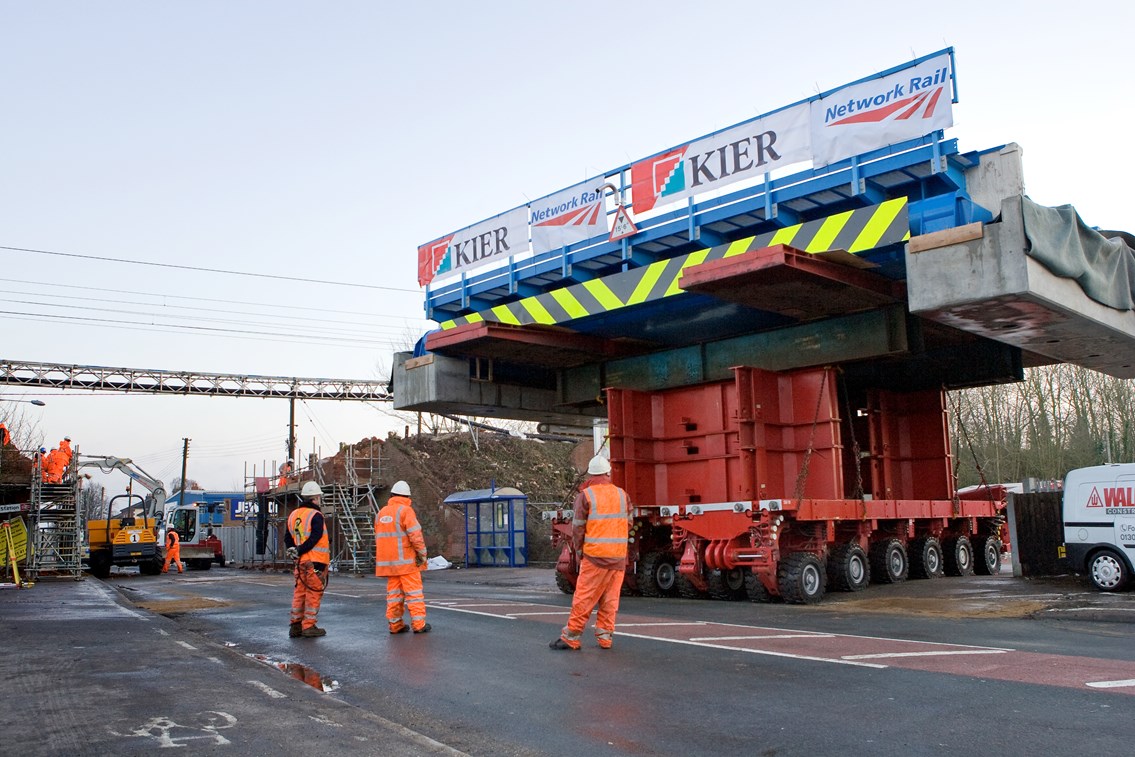 Diss bridge replacement: The replacement bridge deck at Diss is brought to site on the back of an abnormal load-carrying vehicle.