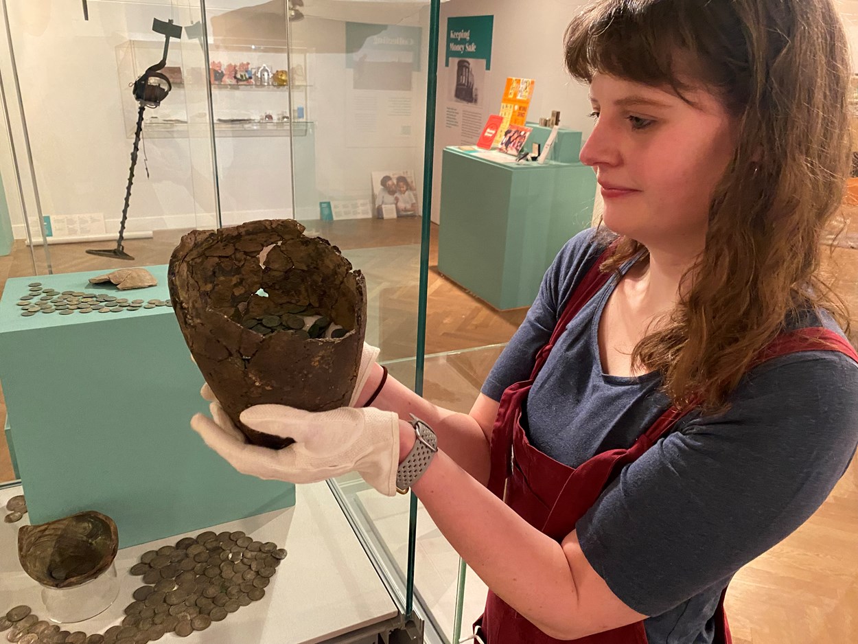 Money Talks hoards: Rachael Dilley, Leeds City Museum's curator of exhibitions, with the Cridling Stubbs Hoard, a remarkable stockpile of copper coins which may have been concealed by the owner inside a large jar in around AD 346 in a bid to keep the riches inside safe from Saxon and Irish raiders.