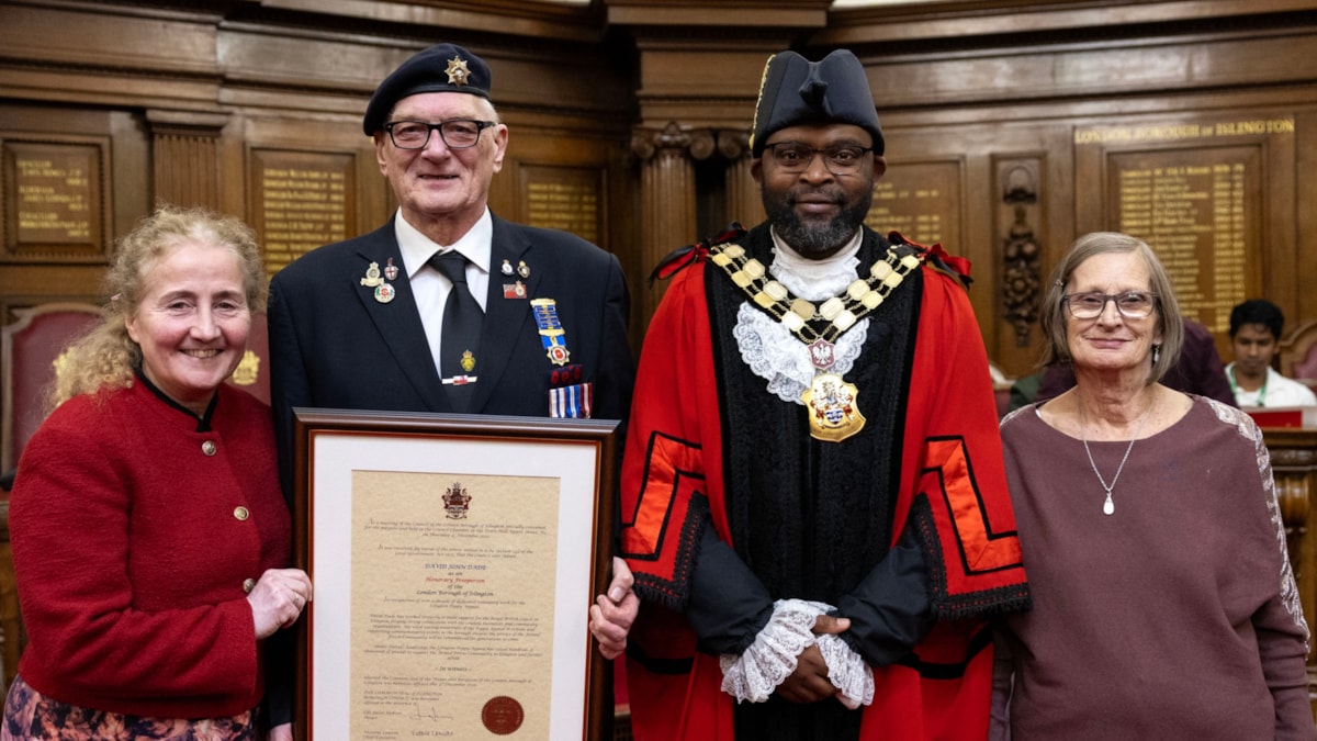 David John Dade receives the Freedom of the Borough with, from left, Cllr Una O'Halloran, Mayor of Islington Cllr Jason Jackson and David's wife Betty. cropped