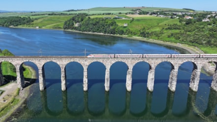 An LNER Azuma passing over the Royal Border Bridge