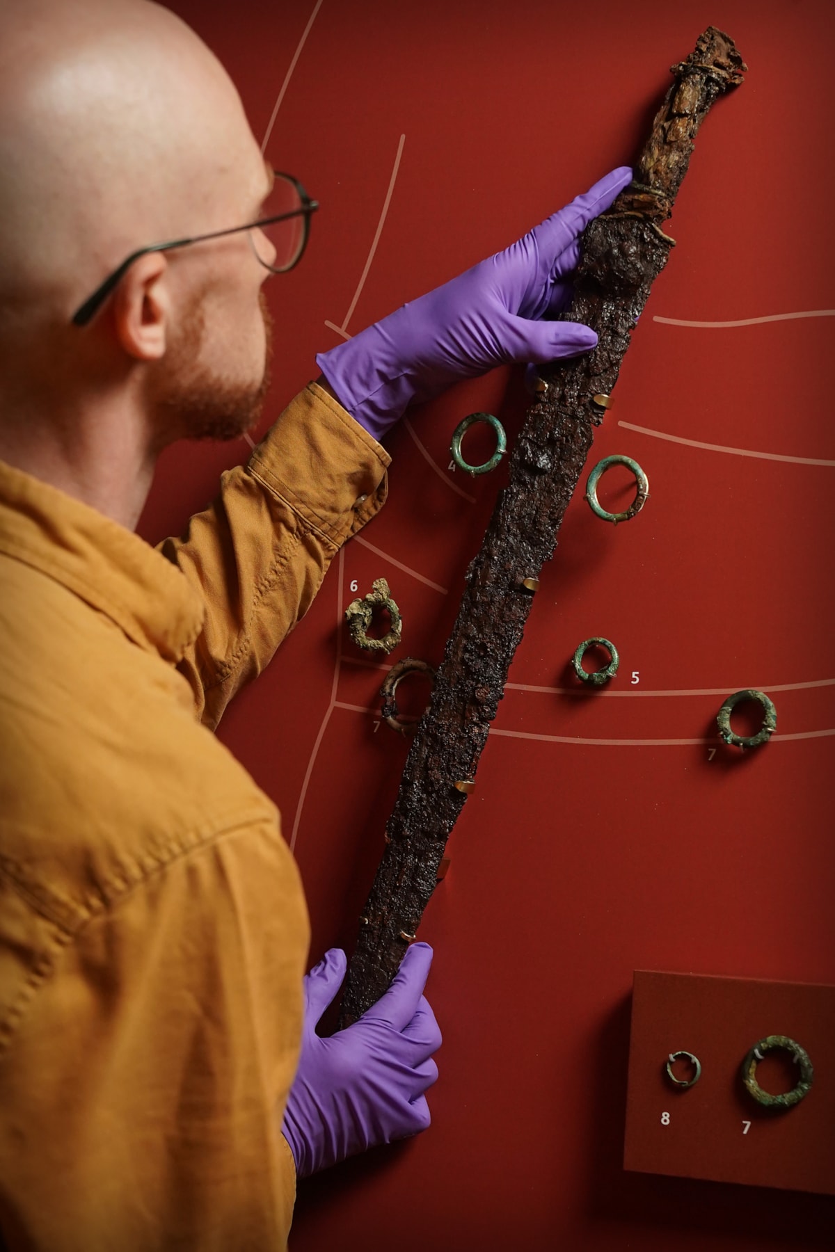 Dr Matthew Knight puts the finishing touches to the Marshill warrior display. Photo © Stewart Attwood  (7)