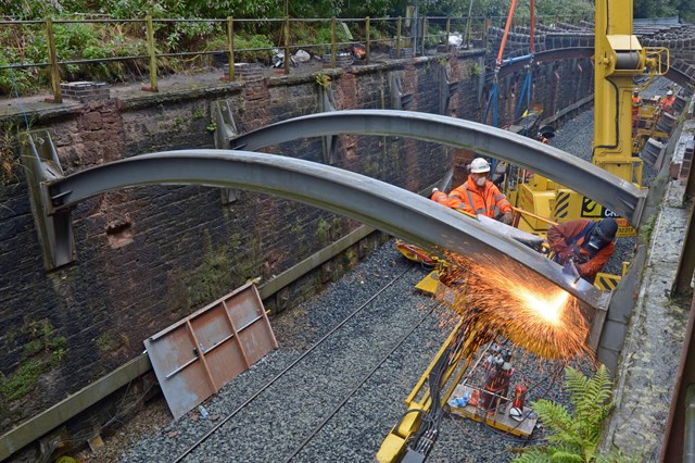 Engineers install the refurbished Chorley Flying Arches