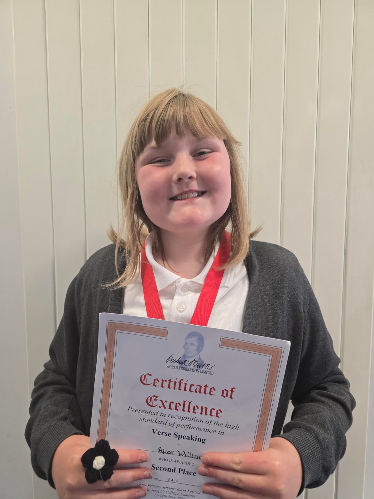 Alice P5C Annanhill PS with her certificate of excellence