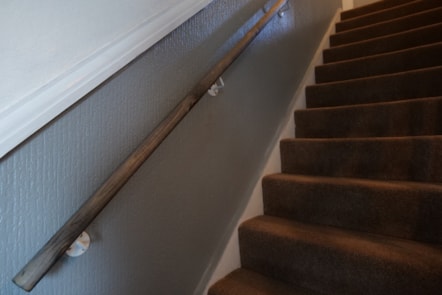 Stair rail installed by Care & Repair