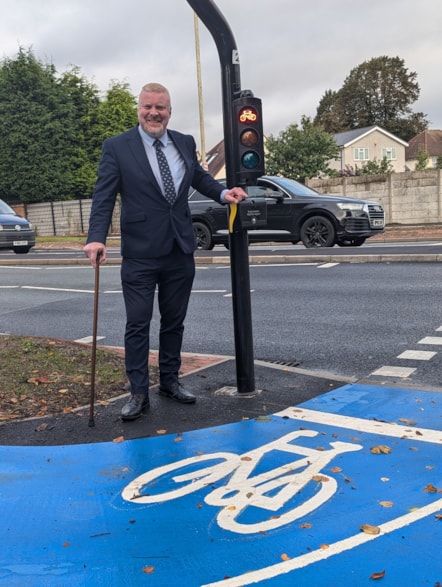 Cllr Damian Corfield at one of the new crossings on Birmingham New Road