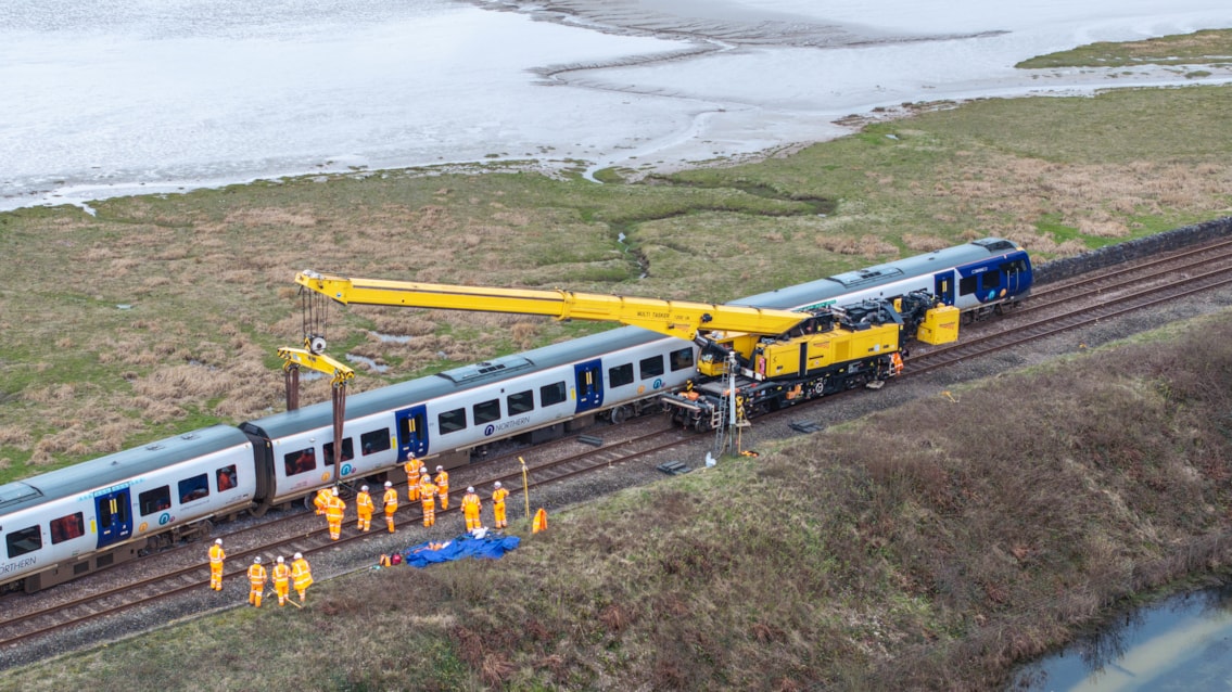 A specialist crane rerailing the train at Grange-over-Sands