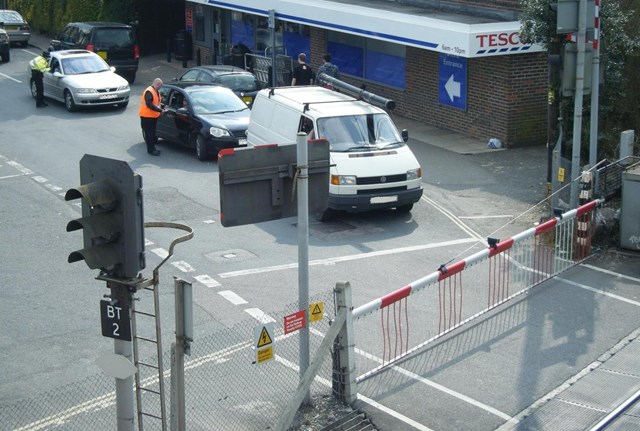 Billingshurst Level Crossing Awareness Day - Motorists: Railway staff and police officers speak with motorists in Billingshurst about the dangers of taking risks at level crossings