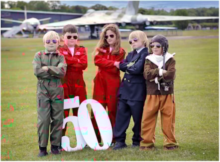 Sebastian Sheppard, Charlie Calder, Ingrid Jamieson, Murdo Waite and Walker Kelly from Athelstaneford Primary mark the National Museum of Flight’s 50th anniversary at East Fortune, East Lothian. Housed on a former Second World War airfield, the attraction opened its doors on 7 July 1975 and now houses an extensive collection of aircraft including a Red Arrows Hawk, a Supermarine Spitfire, a Vulcan bomber and Scotland’s Concorde.
