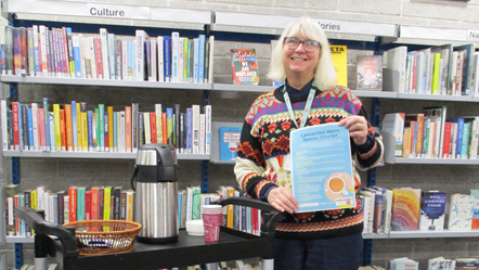 Judith Gratton, library assistant Leyland Library with Lancashire Warm Spaces Charter