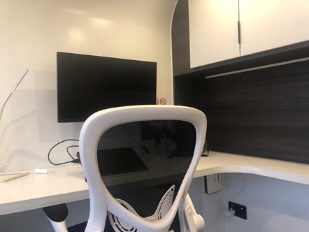 This image shows Northern's workfromhub remote office with a desk and chair