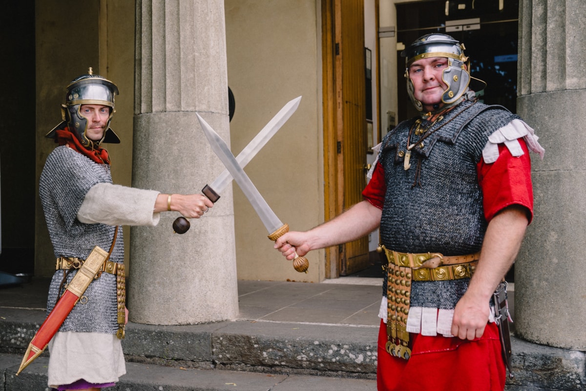 Two Roman 'soldiers' outside the National Roman Legion Museum in Caerleon.