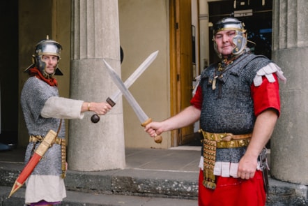 Two Roman 'soldiers' outside the National Roman Legion Museum in Caerleon.