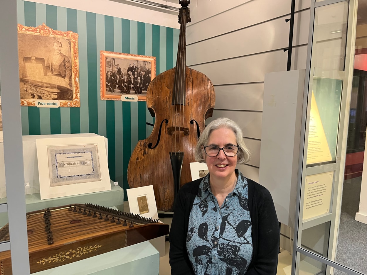 In the Picture: Curator Kitty Ross with a beautiful double bass manufactured by Leeds craftsman Mark William Dearlove, who was violin and bass maker for the Great Industrial Exhibition of all Nations, Crystal Palace, London 1851.
The instrument is on display as part of In the Picture at Abbey House Museum.