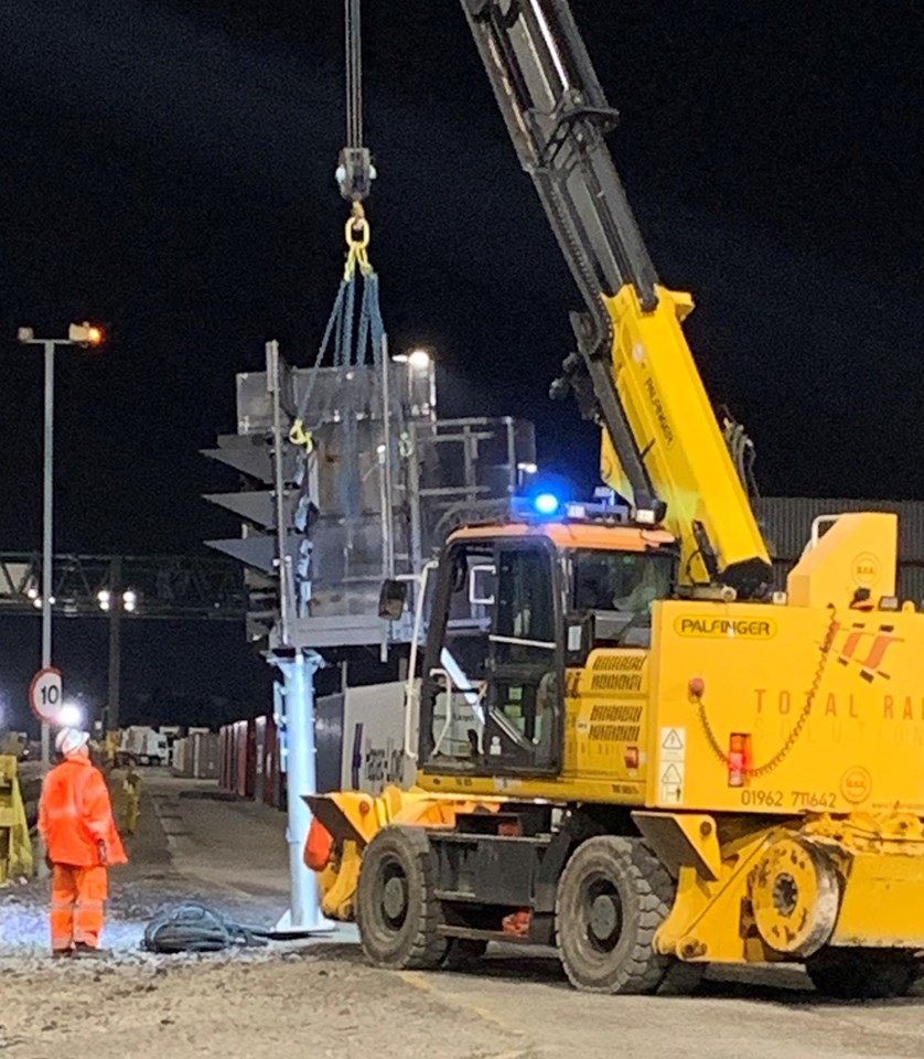 Crane lifting signalling equipment during Trafford Park upgrade