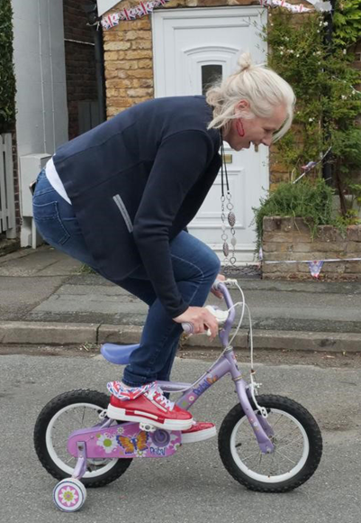 CC Lucy D'Orsi riding a bike-3