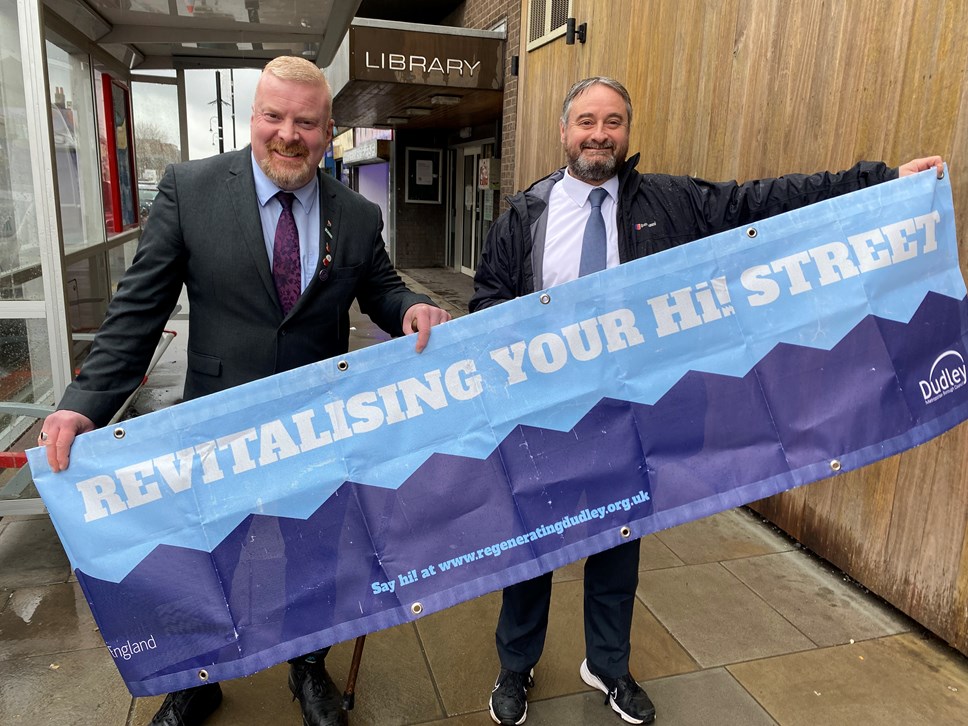 Councillor Corfield and Councillor Bradley step out on the new pavement