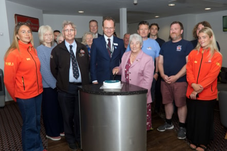 Luke Golding and Janet Madron cut the cake