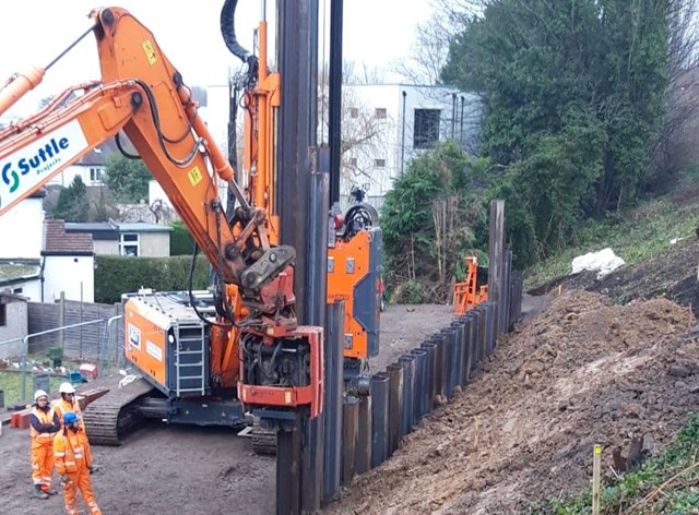 Epsom steel piles landscape: These steel piles were driven into the ground to form a wall of steel to shore up the failing embankement in Epsom