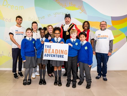 Children at St Joseph's RC Primary School celebrate the launch of The Reading Adventure with (from second-left) Karen Napier, CEO of The Reading Agency, Cllr Una O'Halloran, Executive Member for Community Development, Mayor of Islington Cllr Troy Gallagher, and Cllr Valerie Bossman-Quarshie, Islington's Reading Champion.