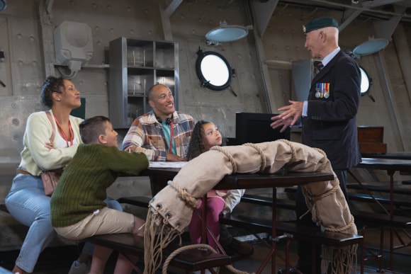 Imperial War Museum Image - A family visiting HMS Belfast