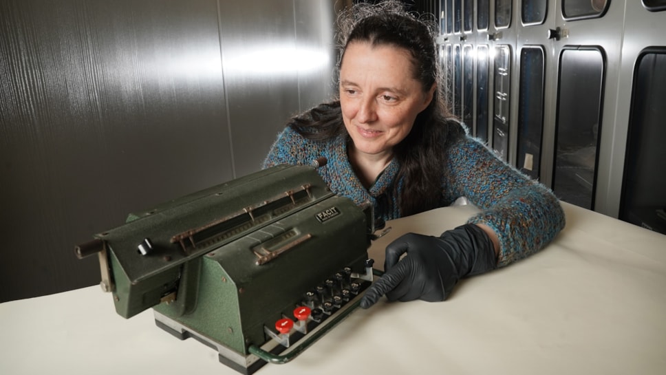 Dr Tacye Phillipson, Senior Curator of Modern Science at National Museums Scotland, with the Facit Model LX calculator