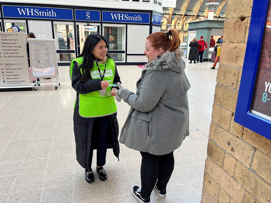 Ivy Yeung from Network Rail talks to passengers at York station, credit Network Rail (2)