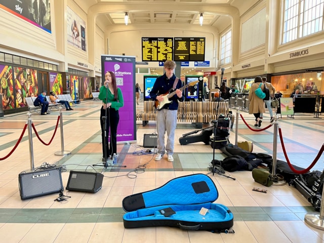 Iz & Liv playing at the launch of Busk in Stations at Leeds, Network Rail