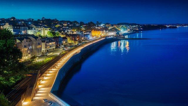 Finishing touches completed on first section of Dawlish sea wall: Completed first section of Dawlish sea wall at night