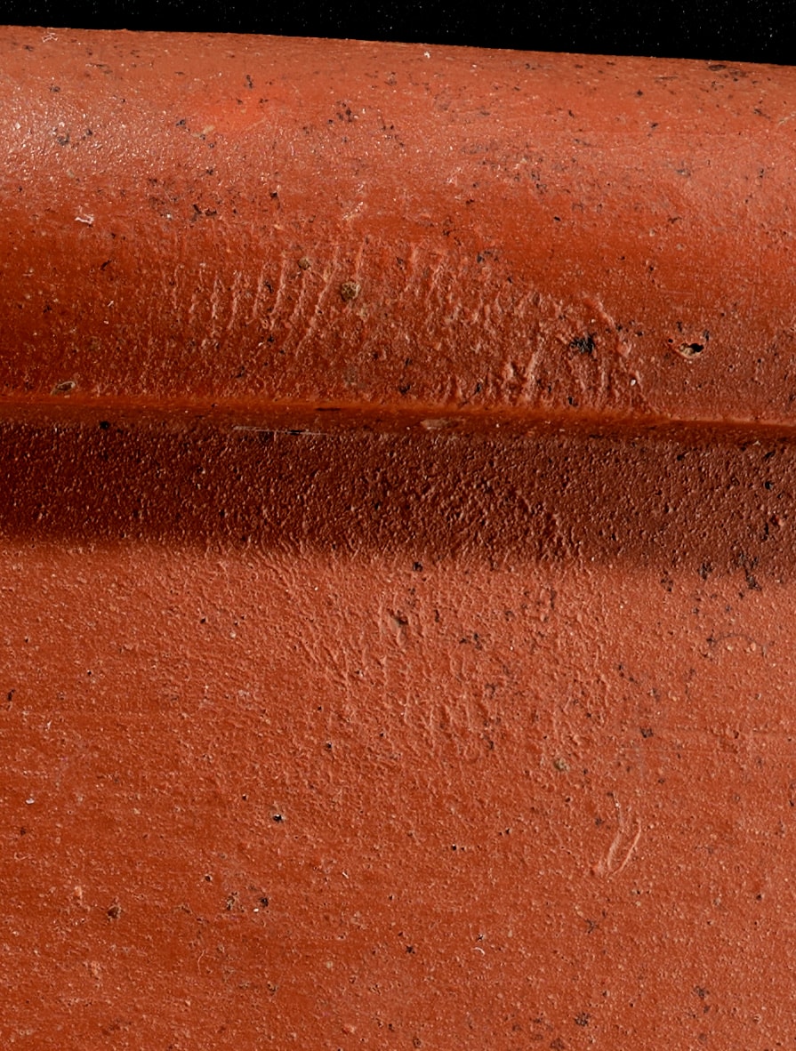 Finger print in Samian ware dish, Inveresk. Photo © National Museums Scotland
