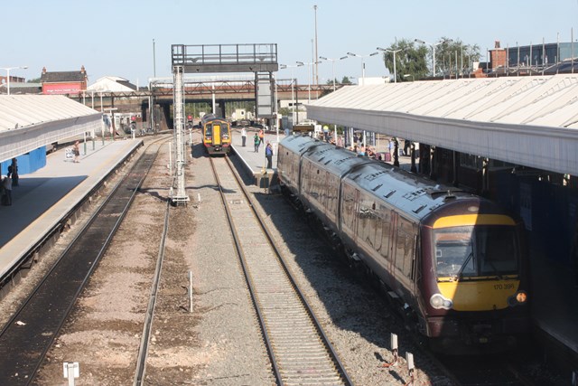 New platform 4 at Nottingham, with an East Midlands Norwich service and Cross Country stabled in 5.: New platform 4 at Nottingham, with an East Midlands 158 Norwich service and Cross Country Turbostar stabled in 5.