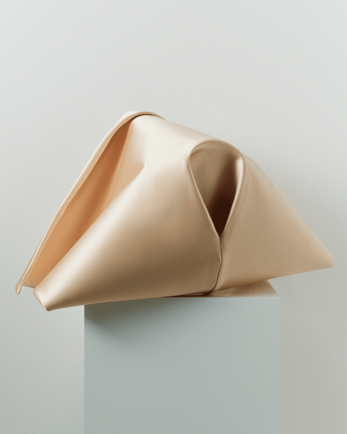 Image of a striking ivory cornette on a mannequin. 

Image Courtesy of JW Anderson.