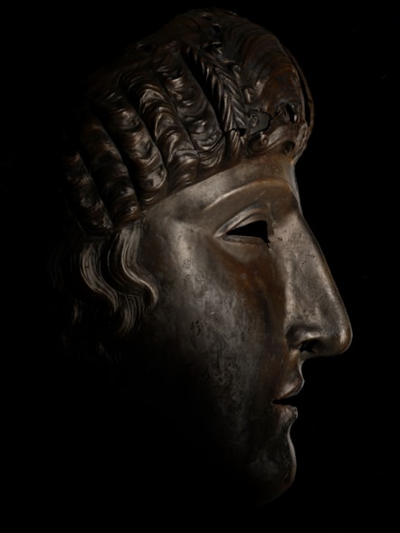 Bronze facemask, Newstead, late 1st Century AD. Image © National Museums Scotland 3