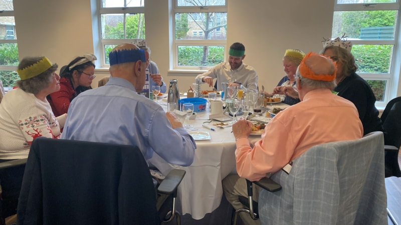 BristolChristmas2024-lunch: Guests eating Christmas lunch