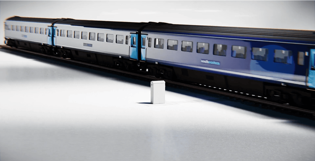 Image of signalling cabinet and train