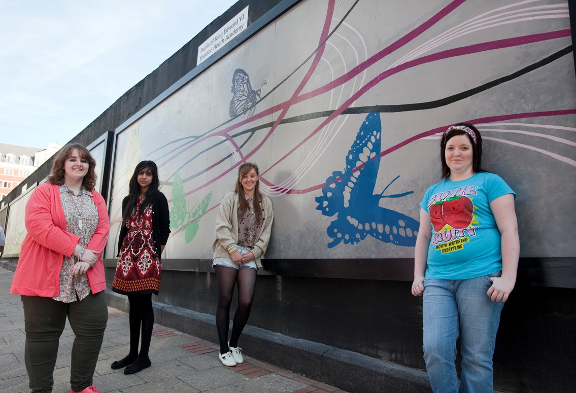 Hill Street artwork: Students from King Edward VI Sheldon Heath Academy with their artwork that is on display near Birmigham New Street station. The location on Hill Street was previously a bare, uninspiring wall covered in green mould. After an approach from Regenerated and Birmingham City Council, Network Rail has worked with the students and local artists to transform the space into a showcase for local artistic talent.