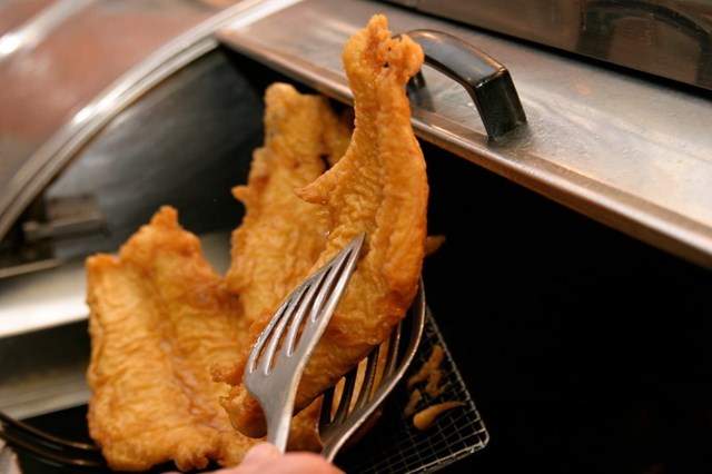 Fish coming out of the fryer