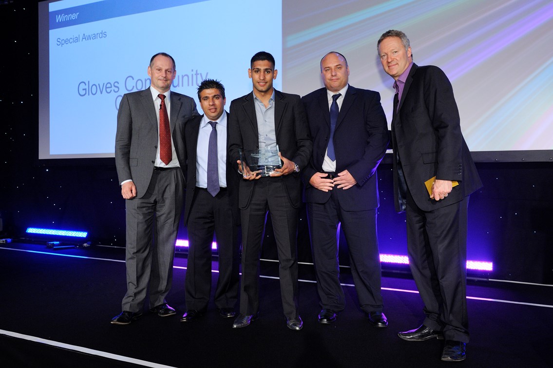 Amir Khan collects a special award for Gloves Community Centre by Iain Coucher: Amir Khan collects a special award for Gloves Community Centre by Iain Coucher
