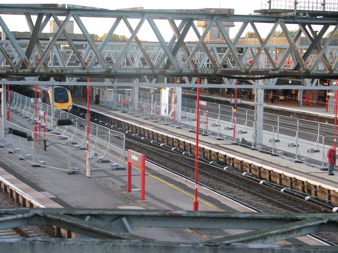 Stafford station platform refurbishment: Fencing on the platforms at the Wolverhampton end of Stafford station shows where work has started on a £3m refurbishment project (Oct 2012)