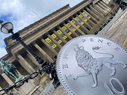 Image shows 10p promo coin in Liverpool