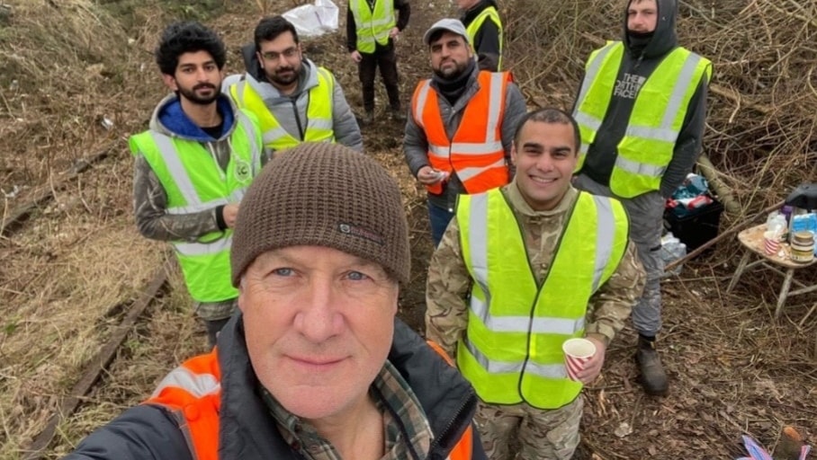 Network Rail gets a hand from King’s Trust in eye-catching Preston clean up: Deepdale - Andy Pratt with volunteers 2 cropped