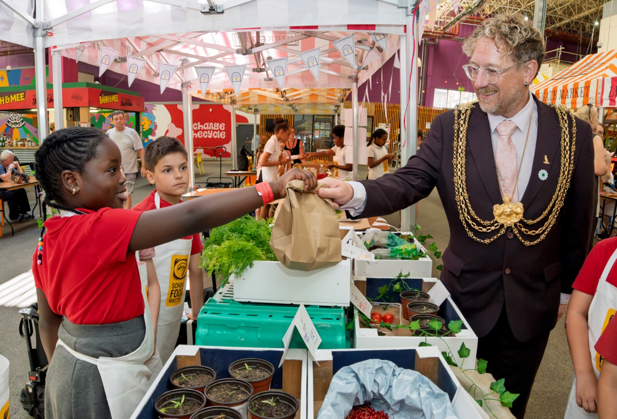 Young Marketeers 1: The Lord Mayor of Leeds, Councillor Stephen Holroyd, at the Young Marketeers event at Leeds Kirkgate Market.