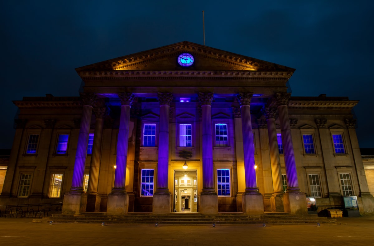 TransPennine Express (TPE) lights up the iconic Huddersfield Train Station in a vibrant blue in support of charity, Shine a Light and Neurofibromatosis Awareness Day.