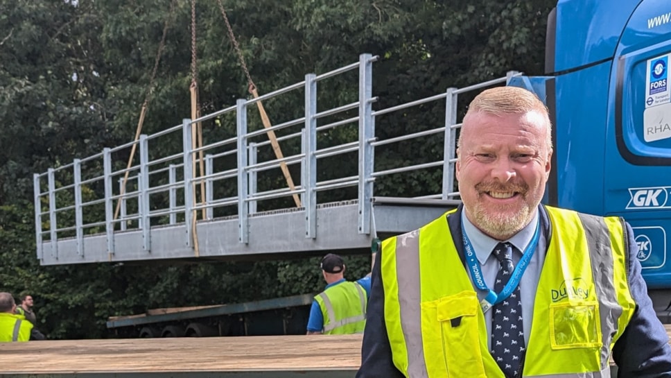 Cllr Damian Corfield near Alder Coppice Primary School, where a replacement bridge has arrived